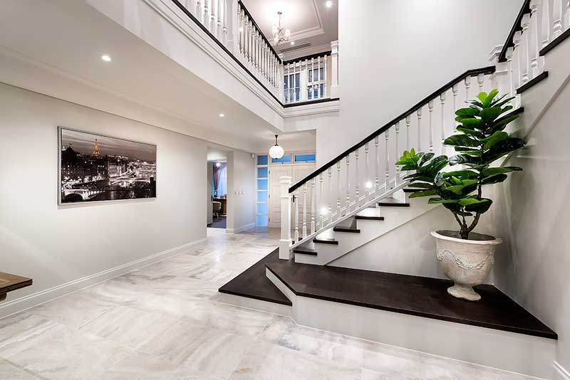 Grand staircase inspired by luxury American beach houses